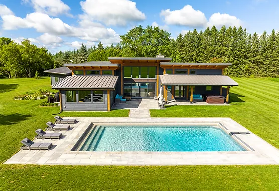 Drone aerial footage of a large home with pool.